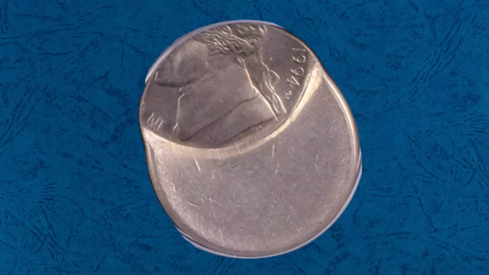 1994 nickel multiple strike off-center error showing overlapping Jefferson portrait impressions